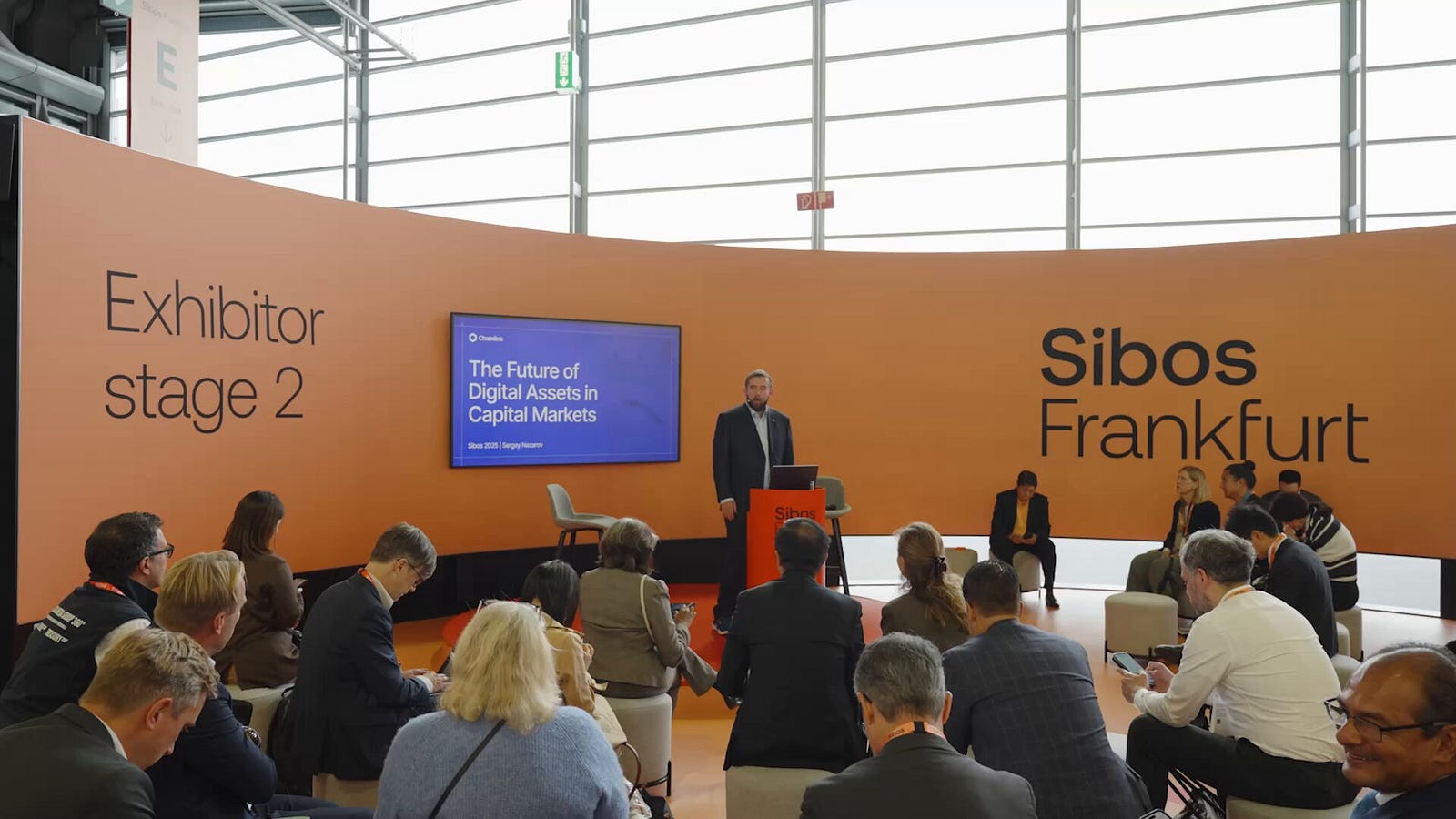 Sergey Nazarov on stage at Sibos 2025